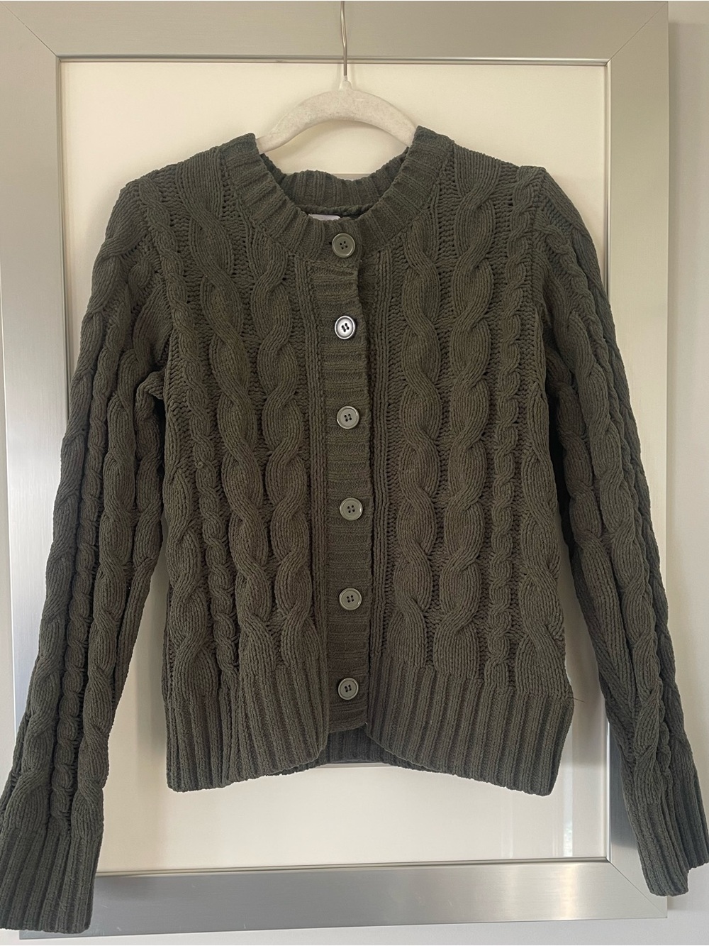 Hippie Rose cardigan featuring a textured cable-knit pattern